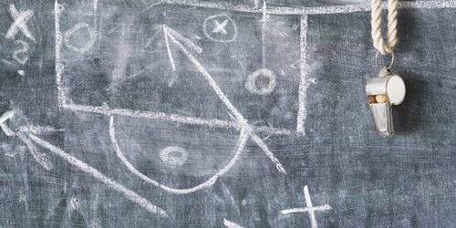 whistle of a soccer or football referee on black board with tact